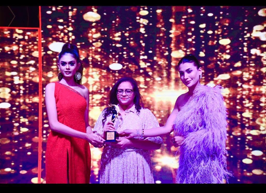 Dr. Purva at an award ceremony