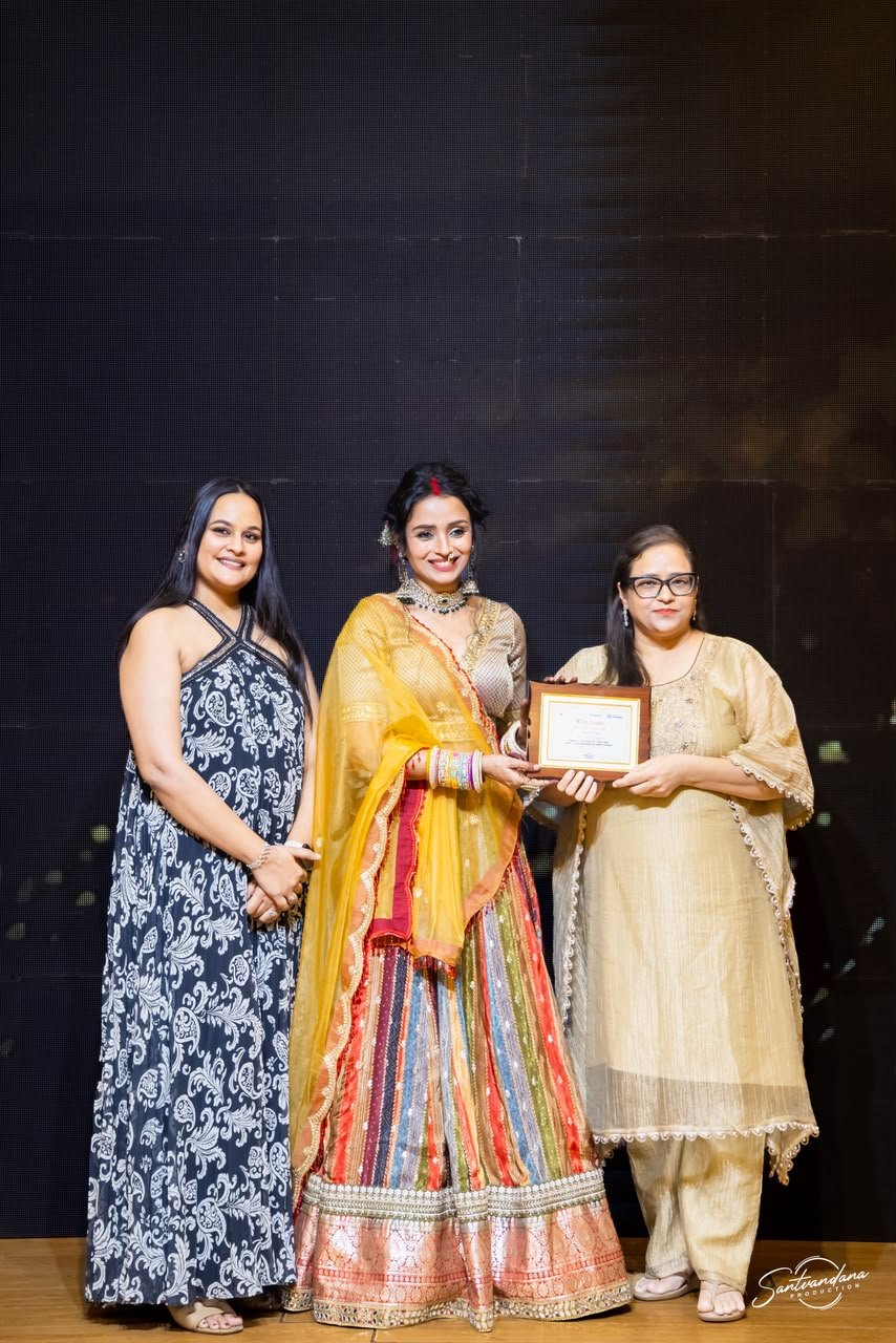 Dr. Purva at an award ceremony